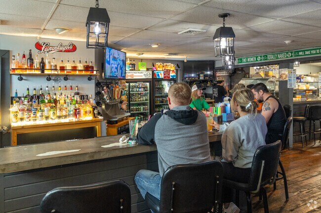 Mama T's Smokin Eats offers  Southern comfort, Cajun, Creole, smoked meats and cocktails.