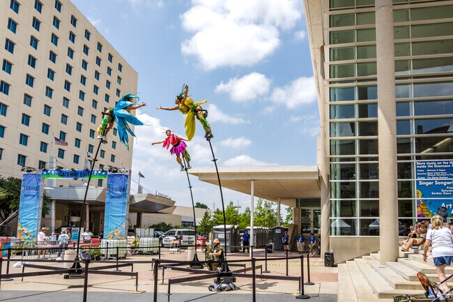 Richardson's Wildflower Festival Acrobats keeps the crowds entertained.