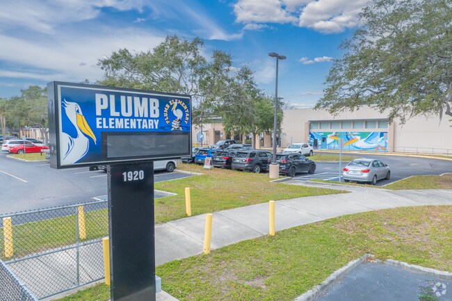 Plumb Elementary School entrance welcomes students with a colorful mural nearby to University Park.