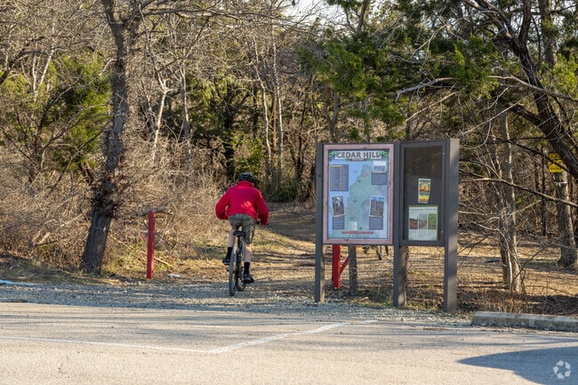 Bikers explore rugged terrain on DORBA bike trails at Cedar Hill State Park.