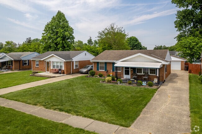 Single-family homes sit on relatively compact lots throughout the streets of Church.