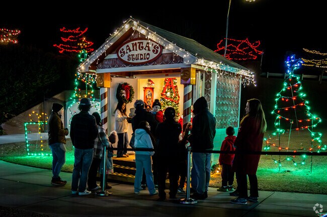 Kannapolis residents enjoy the Christmas lights at Village Park.