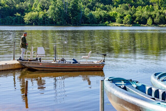 A fisherman from Frazier Marsh launches for an afternoon on the lake.