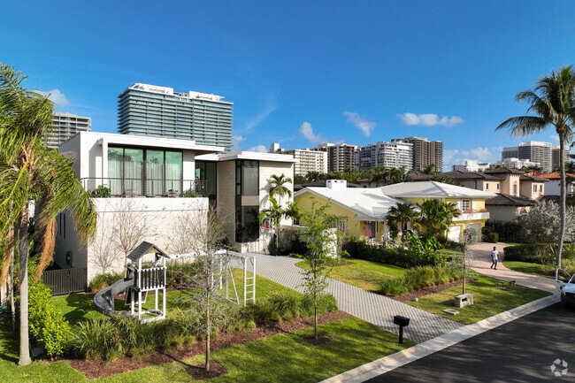Beautiful single family homes lining up on the safe and secured streets of Bal Harbour.
