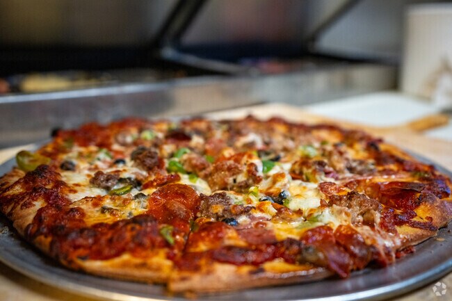 Roma II Pizzeria serves one of the best slices of pizza in Sacramento.