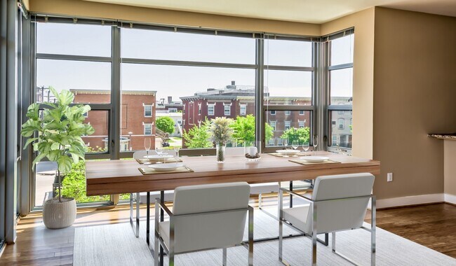 Floor to ceiling windows in each home and wood flooring throughout
