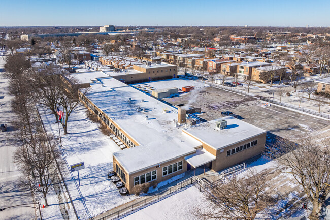 Earhart Elementary School features a yellow brick design.