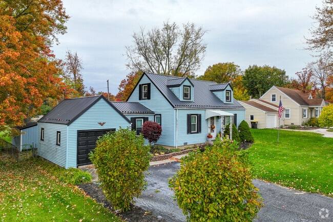 A modern twist on a traditional home with vibrant accents in the Bellair neighborhood.