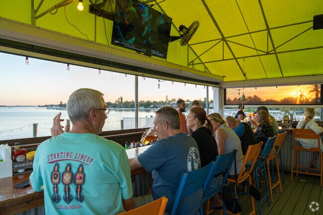 The Old Key Lime house offers Lantana Pines beautiful sunset views of the ocean.