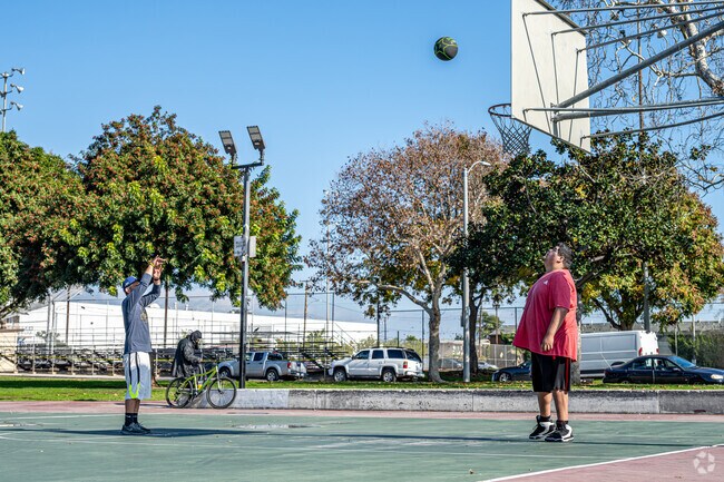 Residents start a pickup game at Montebello City Park.