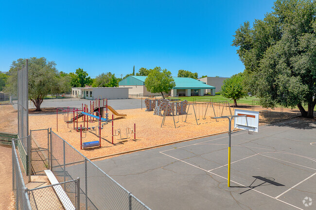 Kids enjoy the play equipment at Alta Mesa Elementary School.