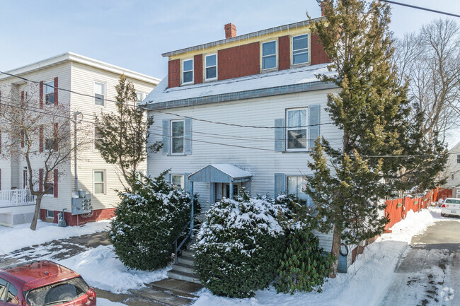 Lush trees surround homes in Knightville but get covered with snow in the winter.