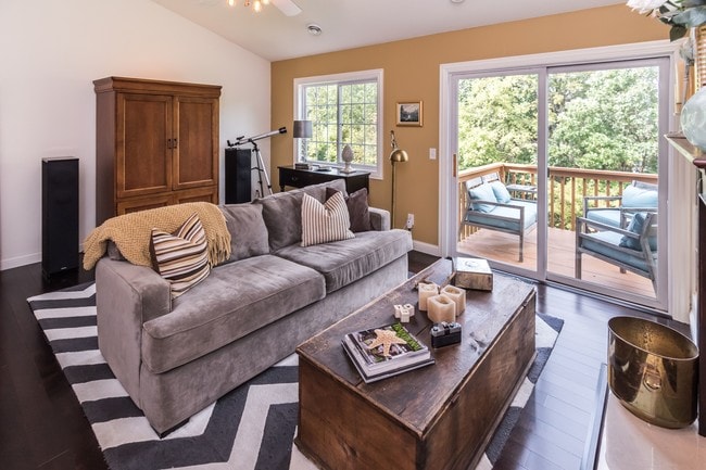 Living room that leads to a lovely deck and private views.