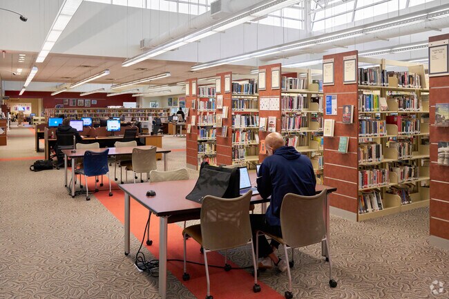 Residents utilize the resources at the Ashburn Library near Ashburn Village.