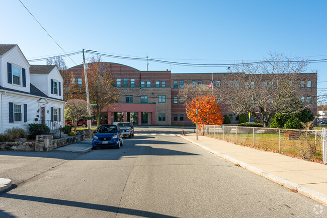 A residential street view walking towards Delsesto Middle School located in Providence.