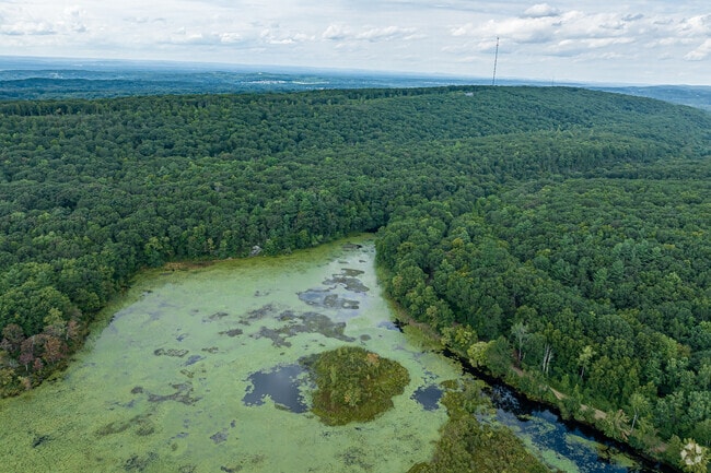 Bolton Notch State Park has 95 acres of trails to hike and caves to explore.