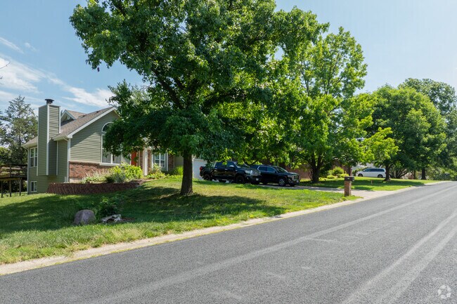 Homes in Cedar Lake are often hidden behind large, mature trees.