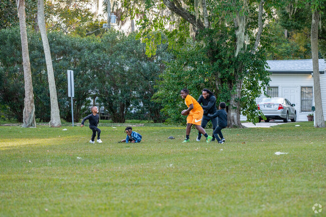 South Daytona families enjoy the grassy fields of Central Park.