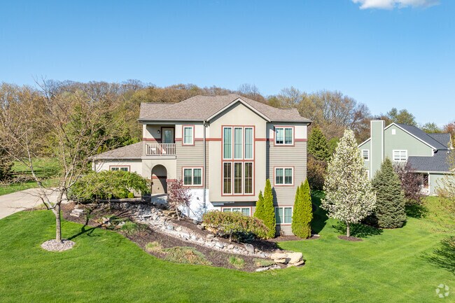 New-traditional homes are popping up all over Okauchee Lake.