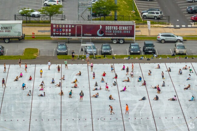 The Dobyns-Bennett High School band practices in prepartion for football games which are a big draw for Highland Park residents.