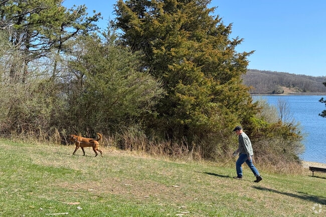 Walking with a furry friend is a favorite activity at Round Valley Recreation Area.