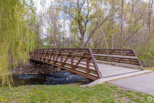 Explore the Parkway Trail at Ford Field Park along the Rouge River near Dearborn Hills.