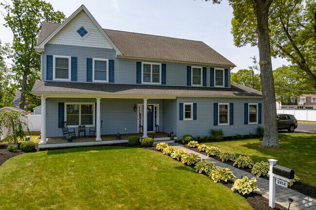Colonial style homes with manicured front lawns can be found in Point Pleasant.