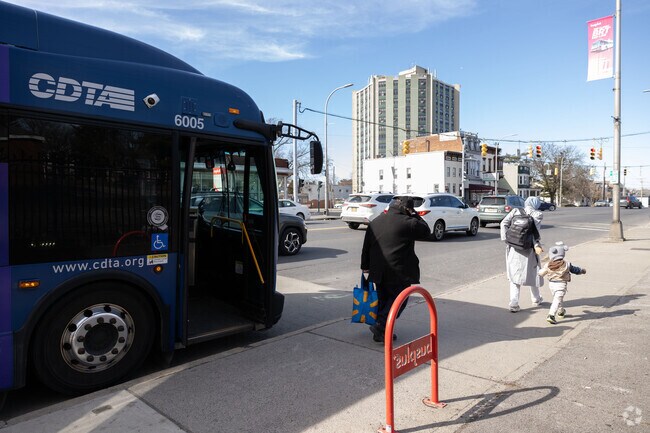 Manning Blvd has a great extensive bus service that will get you around the whole capital region