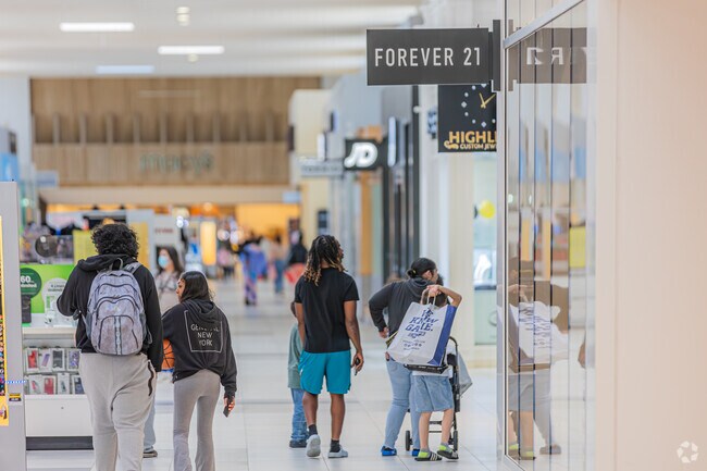 Big brand names allure shoppers at Southland Mall, east of Glen Eden.