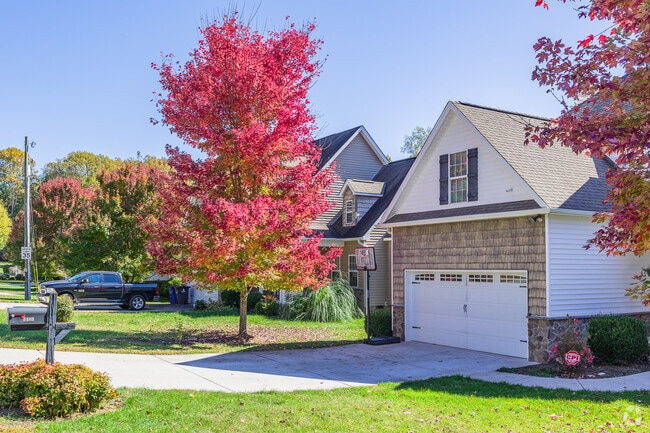 Fall colors often brighten Harmony Grown-Town Center with a scenic seasonal backdrop.