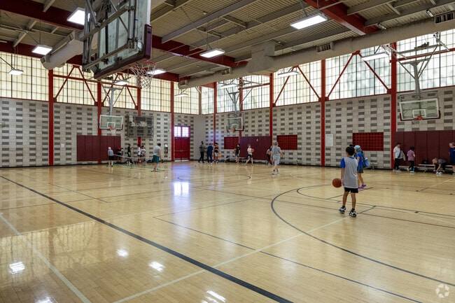 Carmel Mountain Ranch Community Park offers a recreation center with a basketball court.