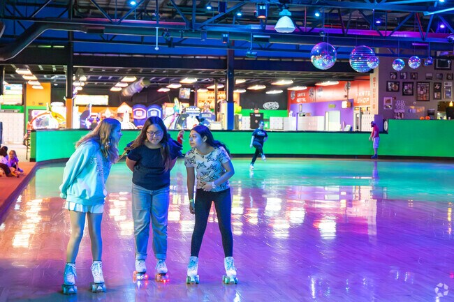 Deerfield families visit Champs Entertainment Complex for a roll around the skating rink.