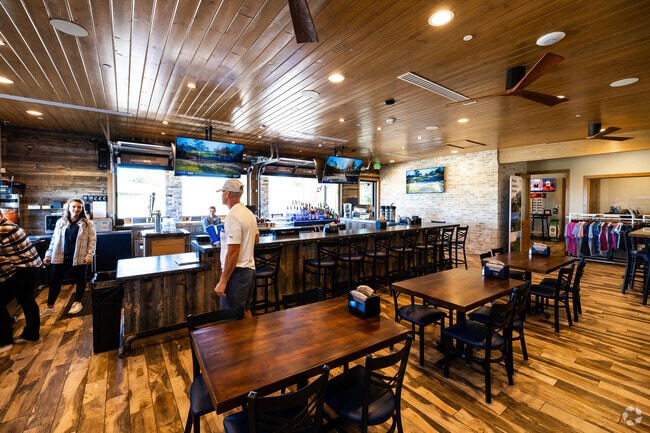 Enjoy drinks and snacks at Plum Creek Clubhouse near the golf course.