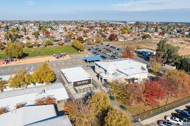 Be Kind mural can be seen on a building at Anna Kirckvater Elementary School.