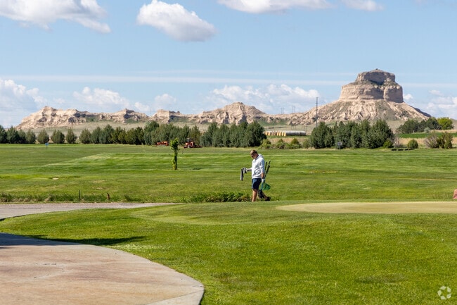 Monument Shadows Golf Course has an 18-hole course, a restaurant, and spectacular views.