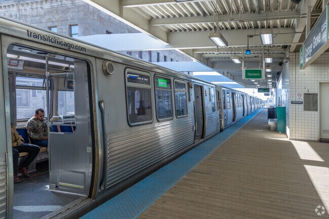 The Cottage Grove CTA Green Line is on the north side of West Woodlawn.
