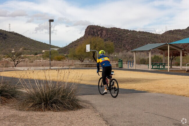 Bicyclists love riding through El Rio Neighborhood Park which gives them access to bike trails.