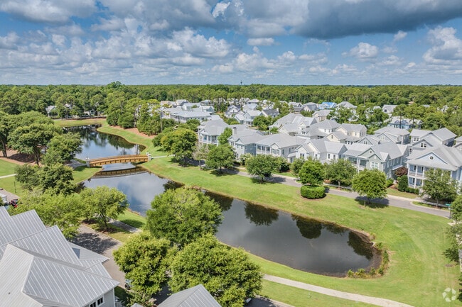 A large lake serves as the centerpiece of Autumn Hall.