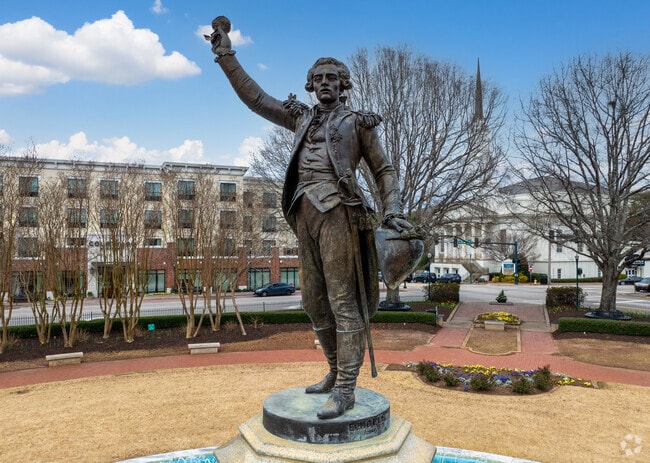 The Marquis de Lafayette proudly occupies the heart of the town square in Lagrange, symbolizing the spirit of liberty and revolution.