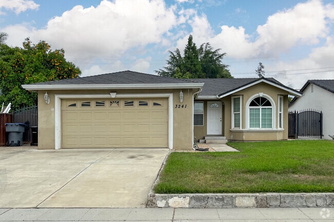 Ranch homes in Hillsdale have pitched roofs and lawn space.
