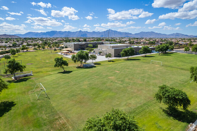 Kicking up fun on the soccer field at Rogers Ranch School in Laveen.