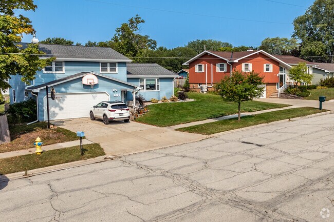 There are several brightly colored homes lining the quiet streets of Firemans Park.