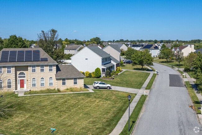 A variety of houses feature large yards and different styles in Woodstown.