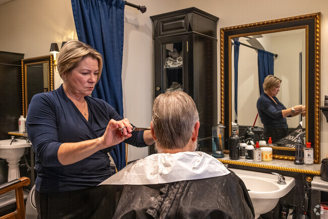 A customer receives a shape up and trim in warm surrounds at Shave Shop, Martinsville, NJ.