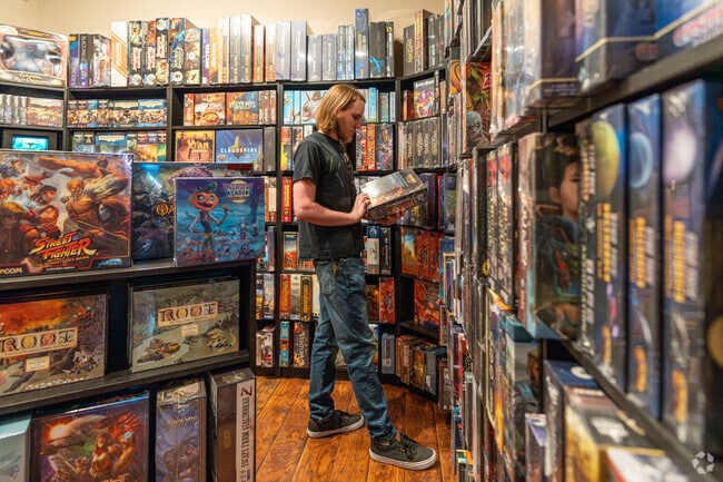 A shopper browses the shop's vast selection of games in Plainfield, Illinois.