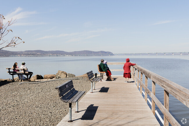Visitors take in the view at the Piermont Pier where once 500,000 GIs departed to fight in WWII.