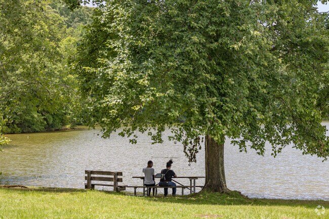 Many people come to Sweetwater Park to enjoy a peaceful time watching the water.