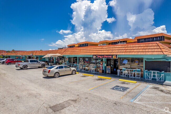 There are a few shopping strips in Indian Shores neighborhood with bars & small shops.