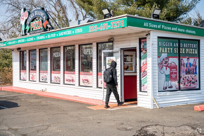 Stop into the Casa Bianca Pizza place to get a delicious slice of your favorite classics.