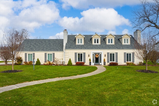 This beautiful Cape Cod is one of the few two story homes in Fort Wayne's Hacienda Village.